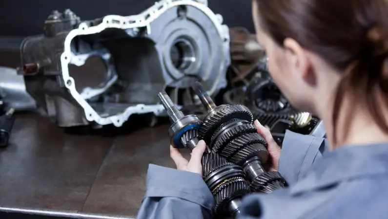 a-mechanic-doing-a-routine-transmission-service