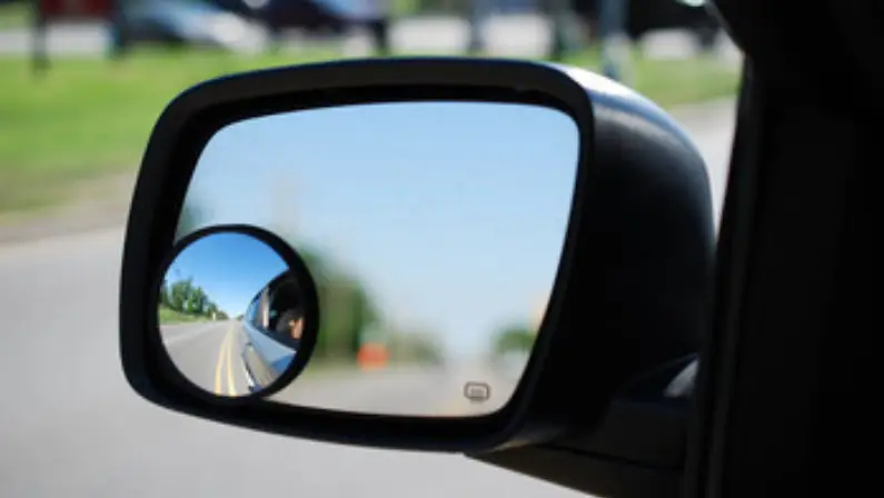 a-car-side-mirror-with-an-attached-blind-spot-mirror