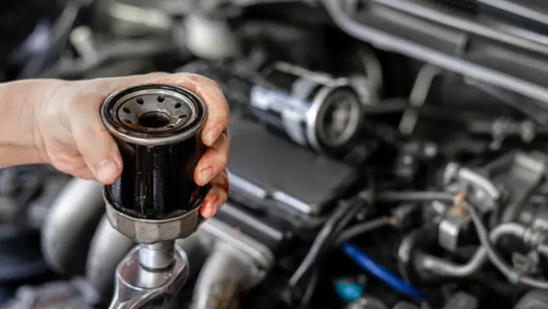 a-mechanic-removing-the-old-oil-filter