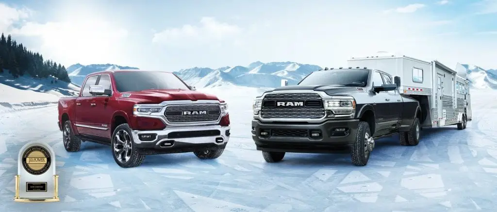 2022 Ram 1500 and Ram 2500 pickup trucks towing horse trailer in snowy mountains - J.D. Power quality award winner