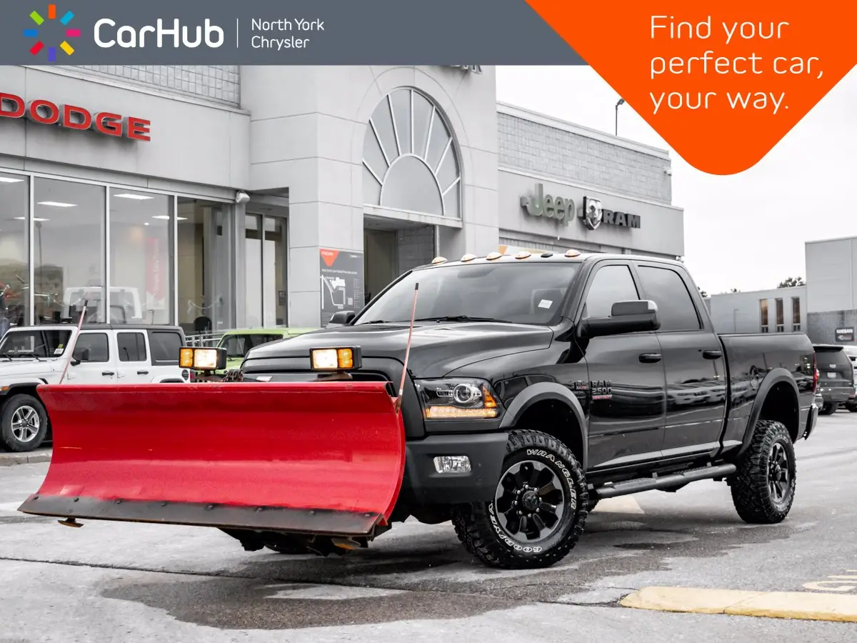 RAM pickup truck with plow