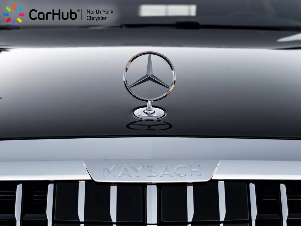 Mercedes-Maybach hood ornament and grille badge close-up - CarHub North York Chrysler luxury inventory