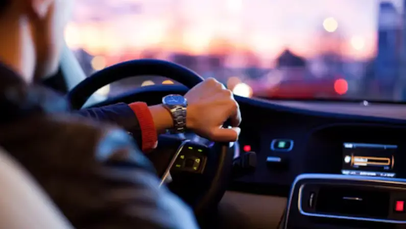 a-man-driving-a-car