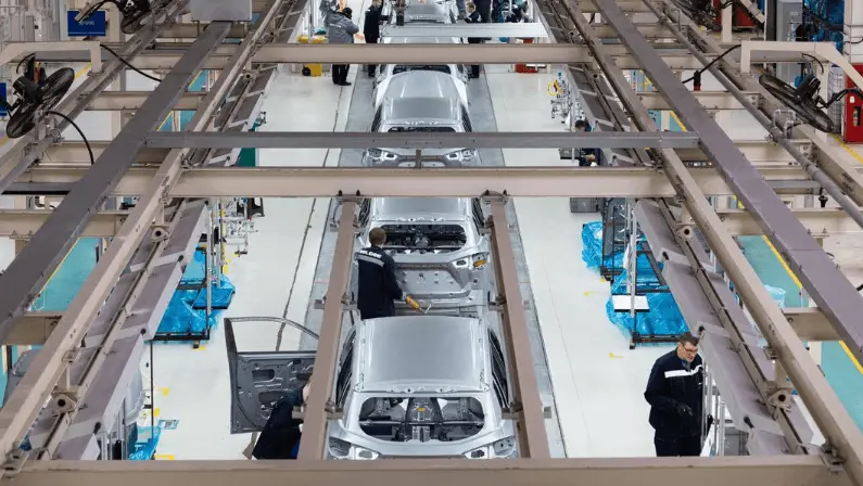 employee-checking-the-quality-of-the-car